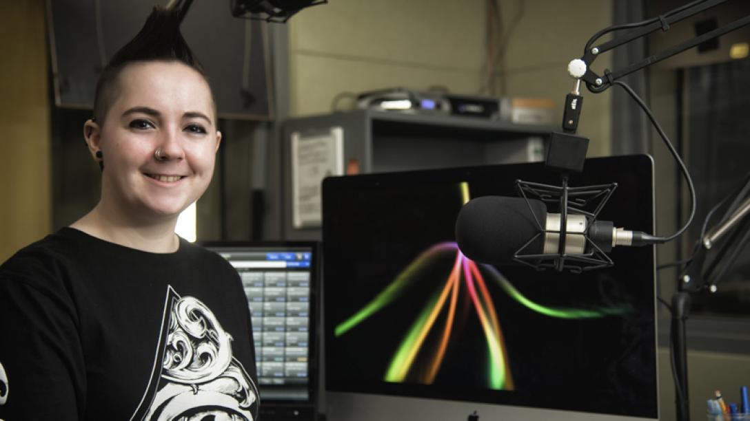 Student smiling at camera