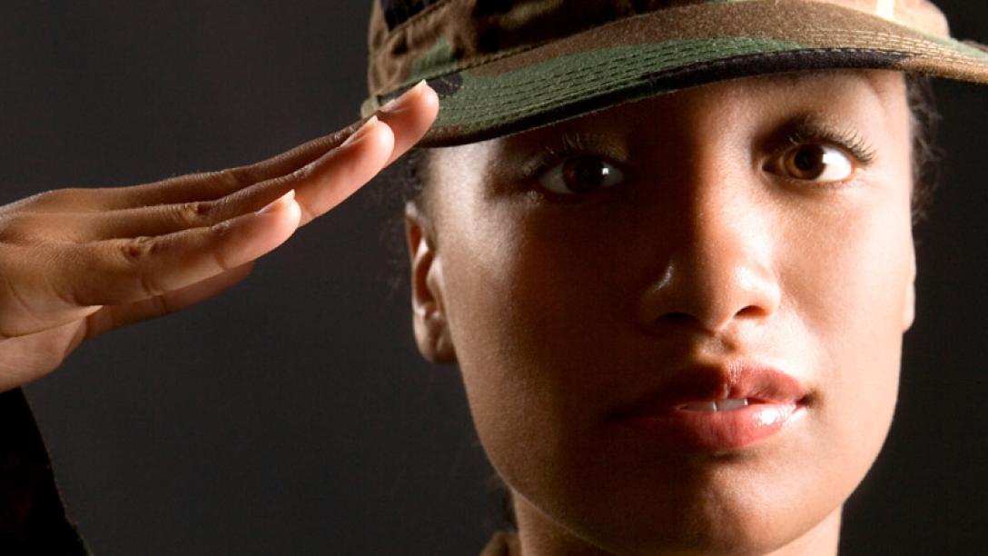 Woman saluting