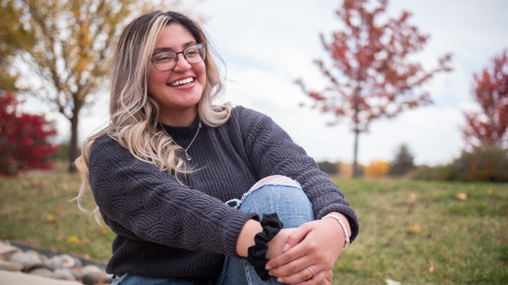 First-generation college student Brisa Sanchez on the Aims Windsor Campus during autumn
