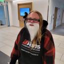 Danielle wearing a fake white beard.
