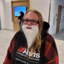 Danielle wearing a fake white beard.