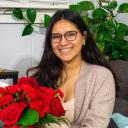 Selena profile picture with red flower