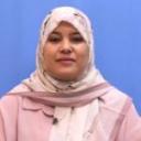 Basma Tumi posing for a picture