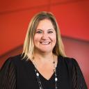 Deena McBain posing for a portrait in the Welcome Center