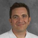 Headshot of Aims business instructor Adam Sanfeliz