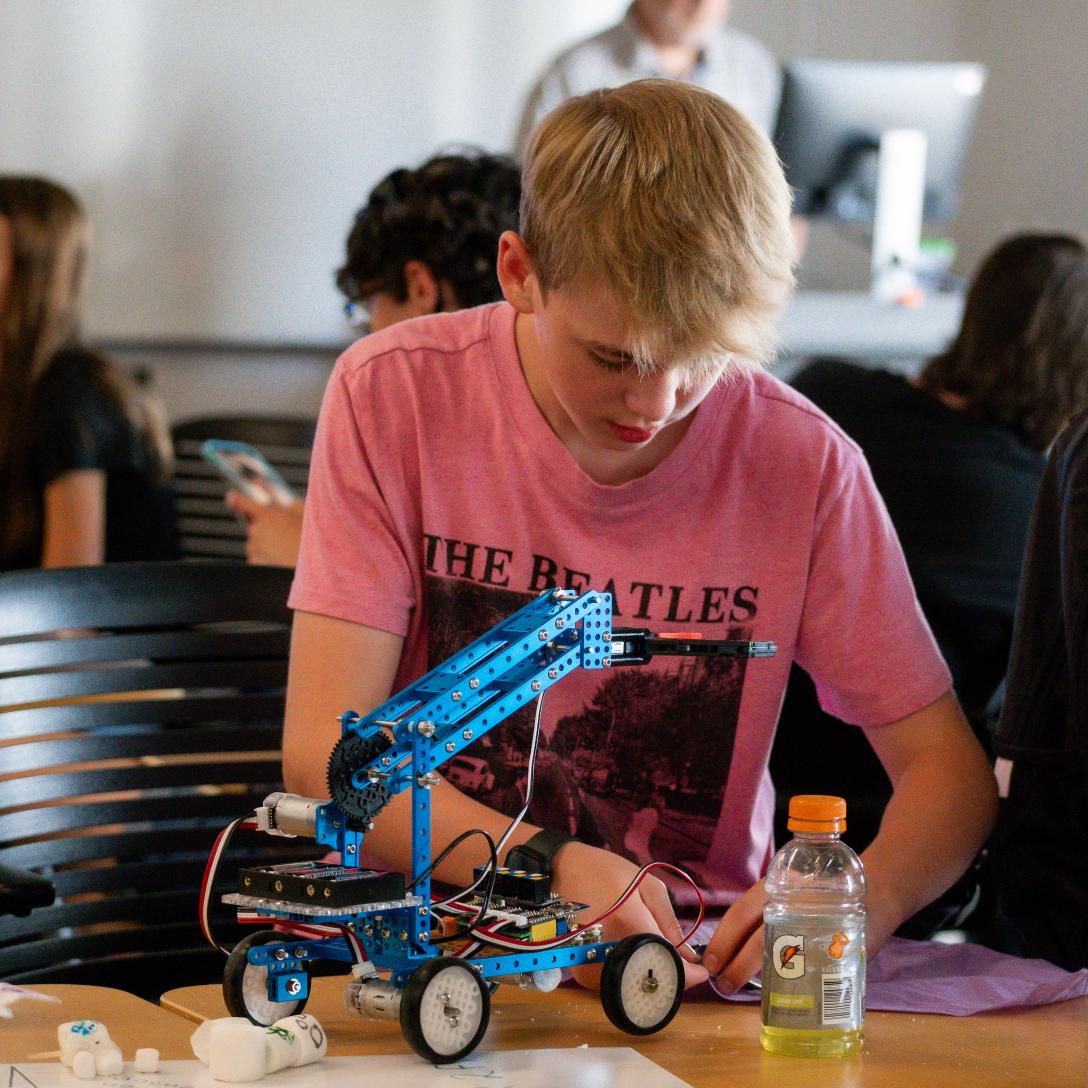 Student working on a robot