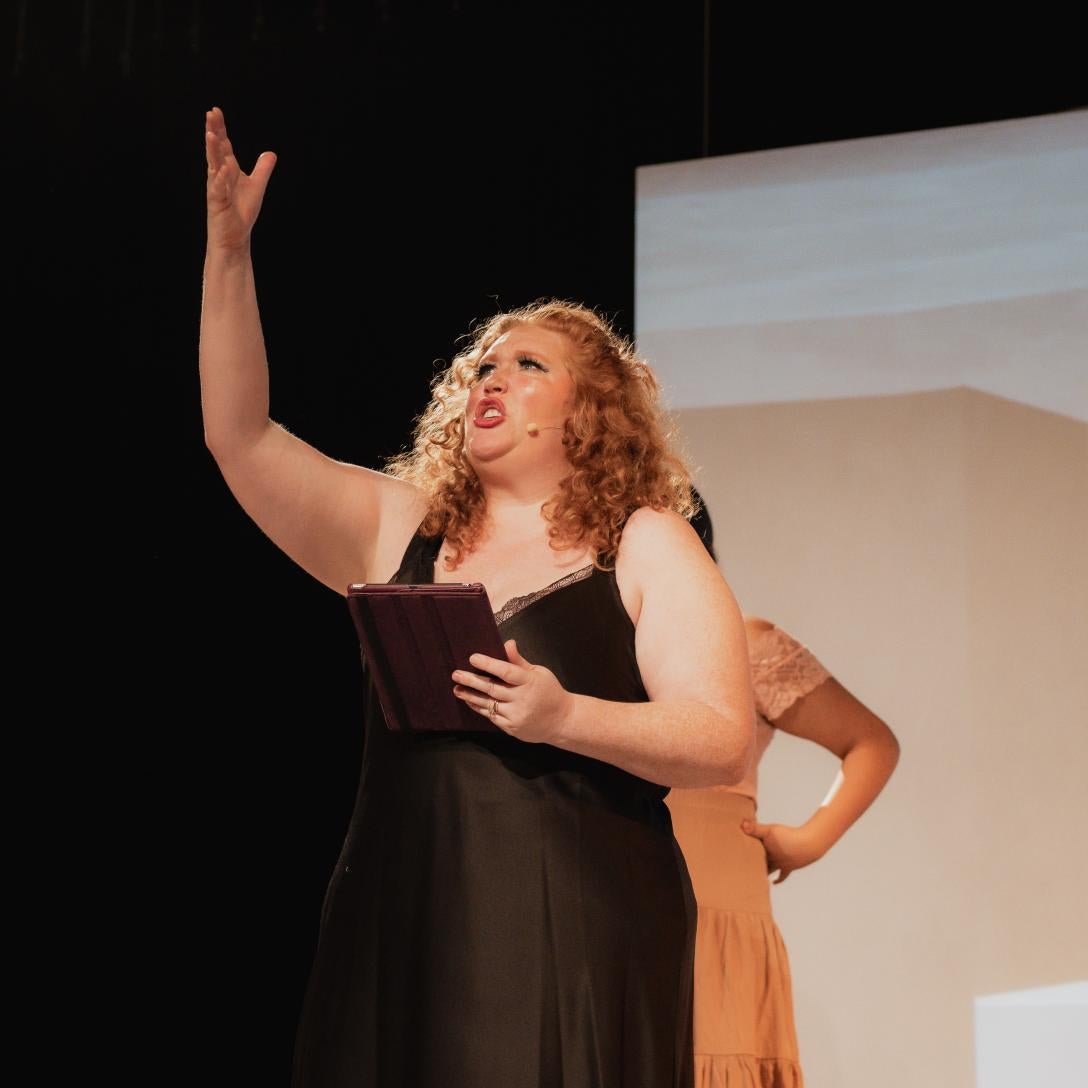 Actress on stage at dress rehersal