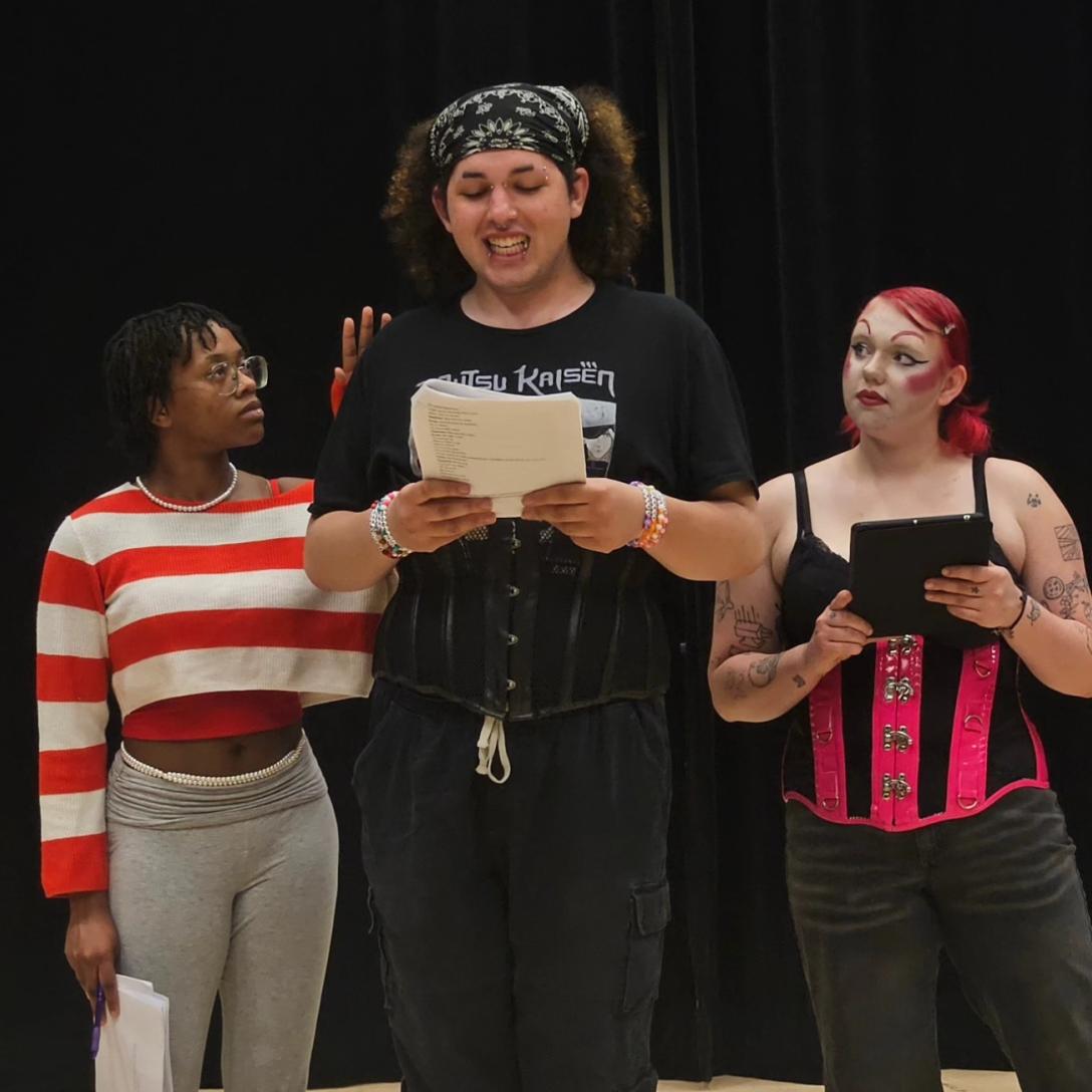 3 student reherse for Rocky Horror Picture Show Shadowcast