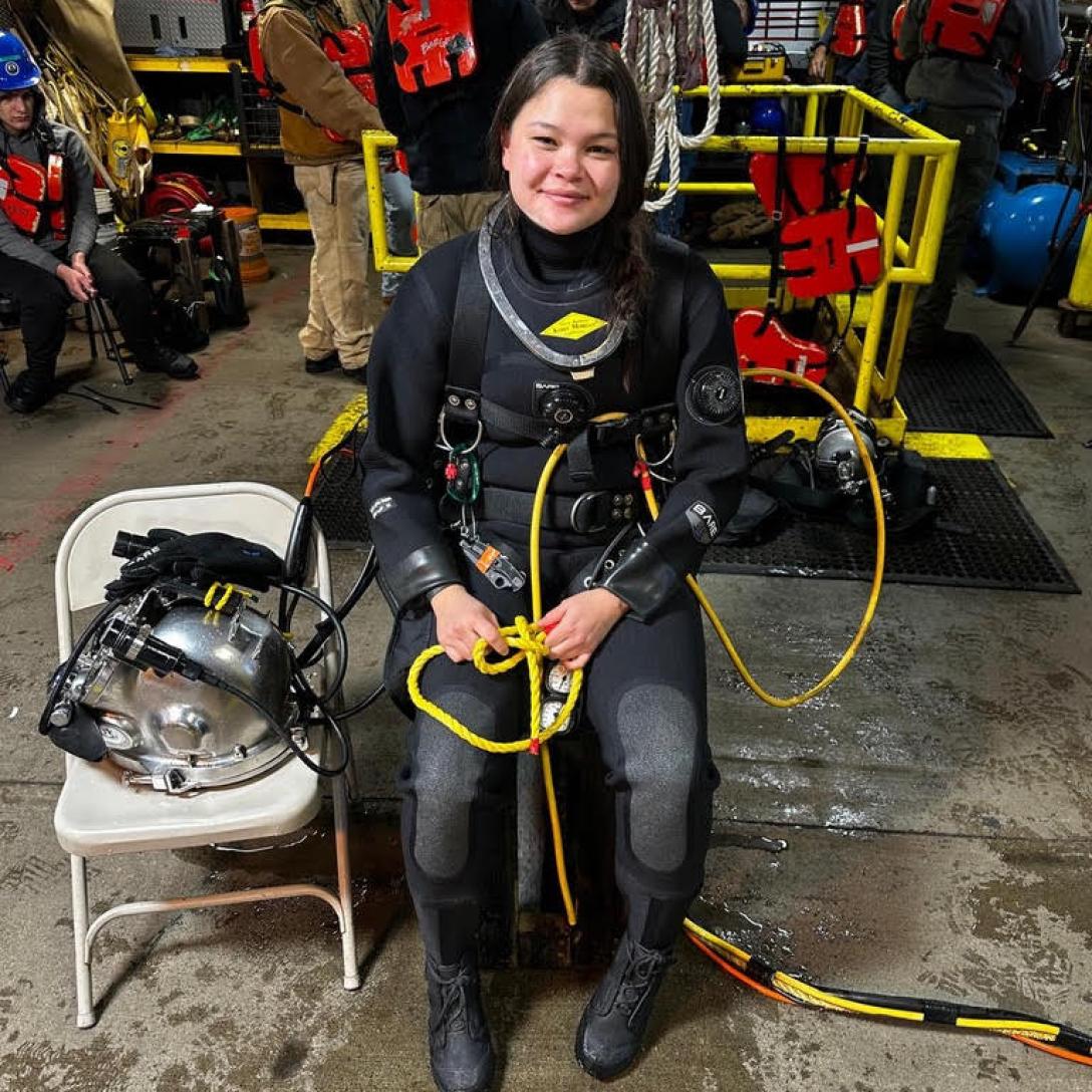 Rylen in SCUBA gear wetsuit