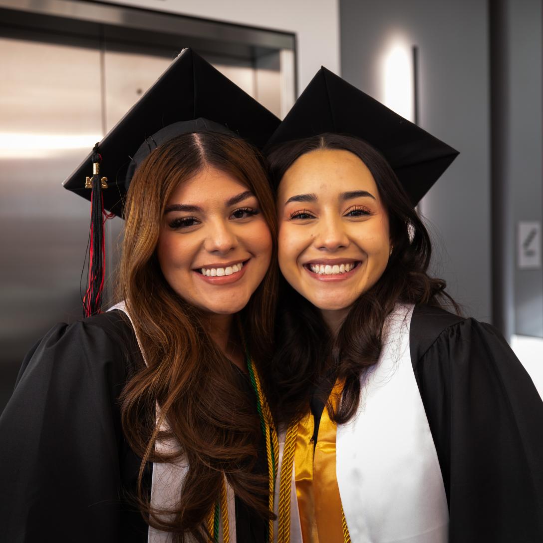 Aims Graduates smiling