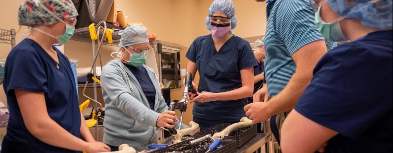 Aims surgical technology associate degree students get hands-on experience practicing using surgical equipment.