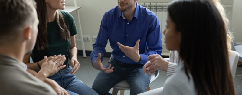 recovery coaching group meeting people sitting in circle