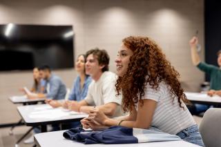College students listening to a classroom lecture