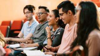 Students engaged in discussion during a lecture