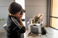 one student taking photo of another student