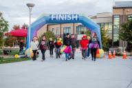 LGBTQ+ fun run partisipants at the finish line