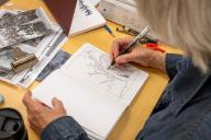 Continuing Education personal enrichment student drawing in a notebook