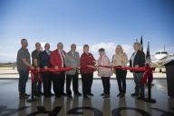 Aims employees and officials at AMTC ribbon cutting