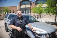 Andrew Brown at Greeley Police Department with Police SUV