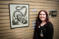 Kayla Sigmon with her art