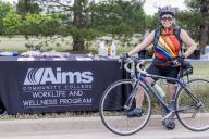 Woman on bike at Let's Bike Day at Aims