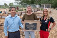 Plaque presentation at the Loveland Youth Gardeners, left to right Phong Tram, Jessica Morgan, and Megan Blaser.