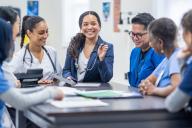 several medical professionals at a table