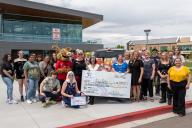 Arty's Pantry Large Check with Group of Employees and Students