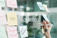 post it notes on glass board 
