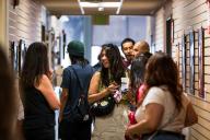 People looking at artwork at the Aims Art Show