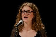 student singing at Ed Beaty Hall Theater