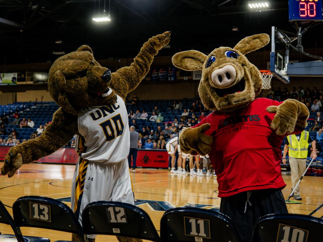 Arty and Klawz at a men's UNC basketball game