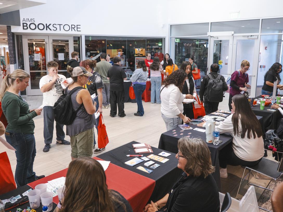 Students at events with booths at Aims Student Commons
