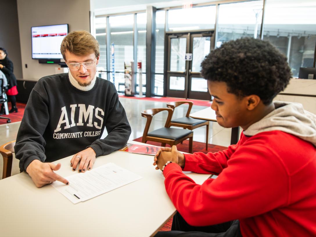 Student with financial aid advisor