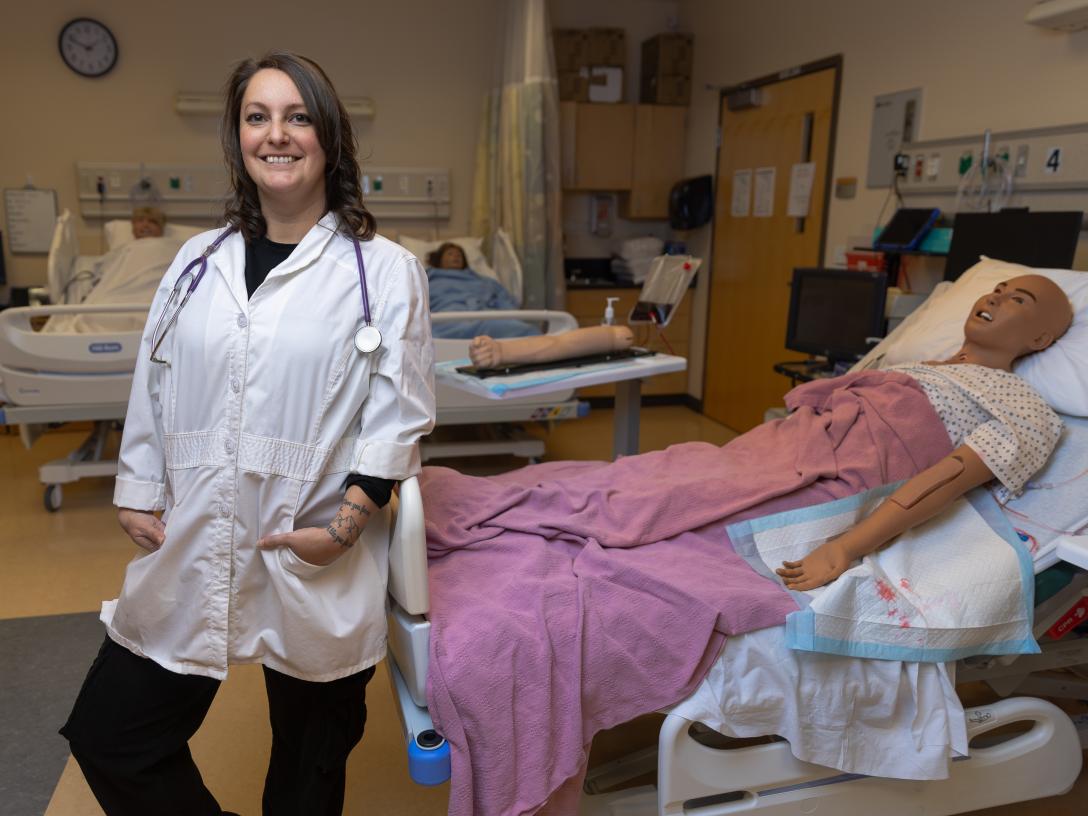 Kendra Henriquez with training medical gear