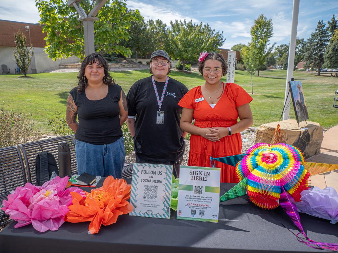 Aims MOSAIC team at event table
