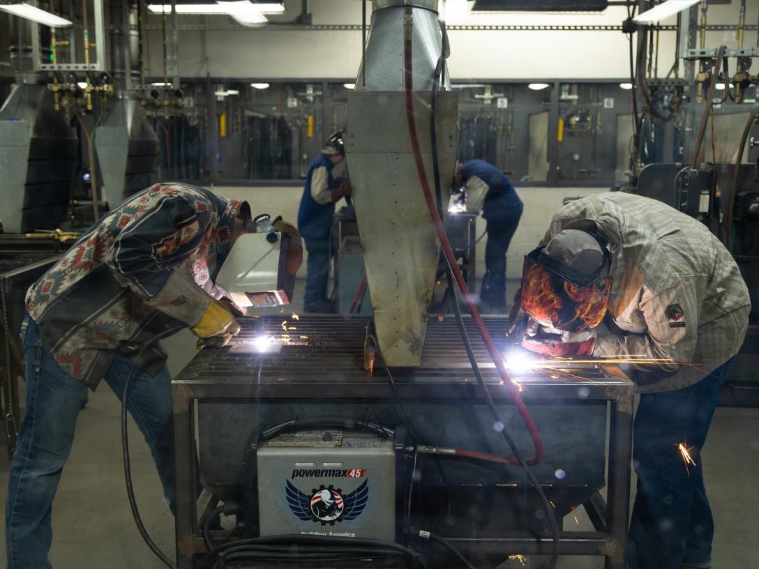 students welding