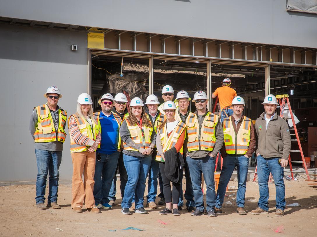 Aims employees at construction site of the Student Health and Wellness Center