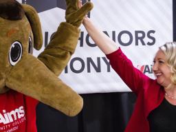 Woman with Aardvark Mascot