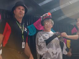 Three people in halloween costumes