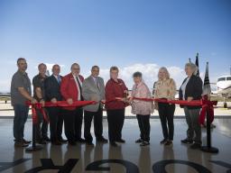 Aims employees and officials at AMTC ribbon cutting