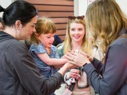 People look at baby chicks at Ag Day Open House
