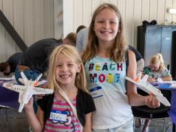 Children at Aviation Day with Airplanes in their hands