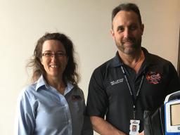 Two people with Zoll Cardiac Monitor