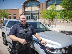 Andrew Brown at Greeley Police Department with Police SUV