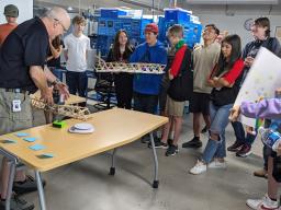 BEST Camp Bridge Building competition - students watching