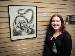 Kayla Sigmon with her art