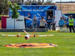 Spectators watching Sentaero BVLOS unmanned aerial system drone take flight