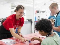 Teach and students at College for Kids