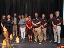 Group accepting award